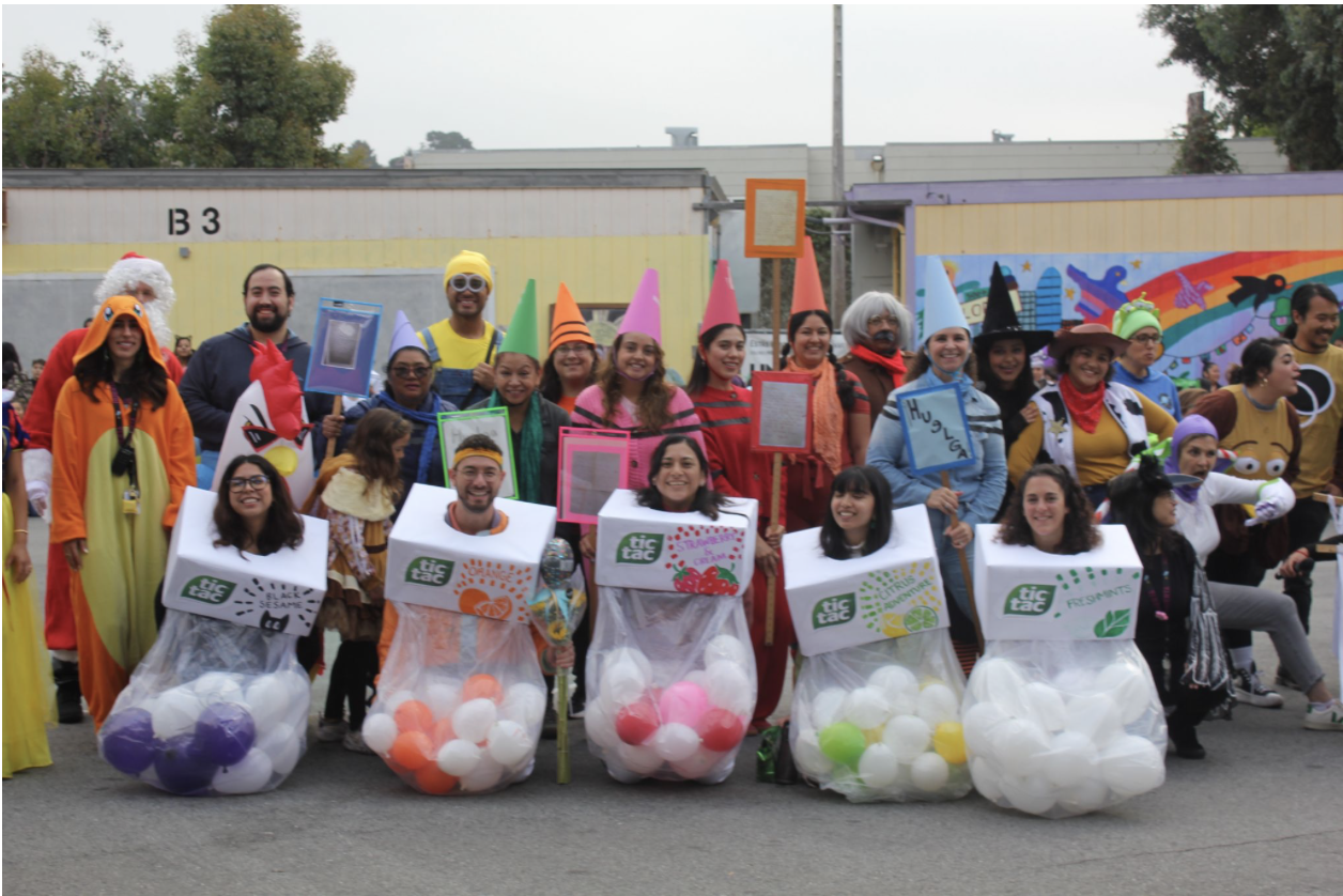 Staff dressed in costumes for the Halloween Parade