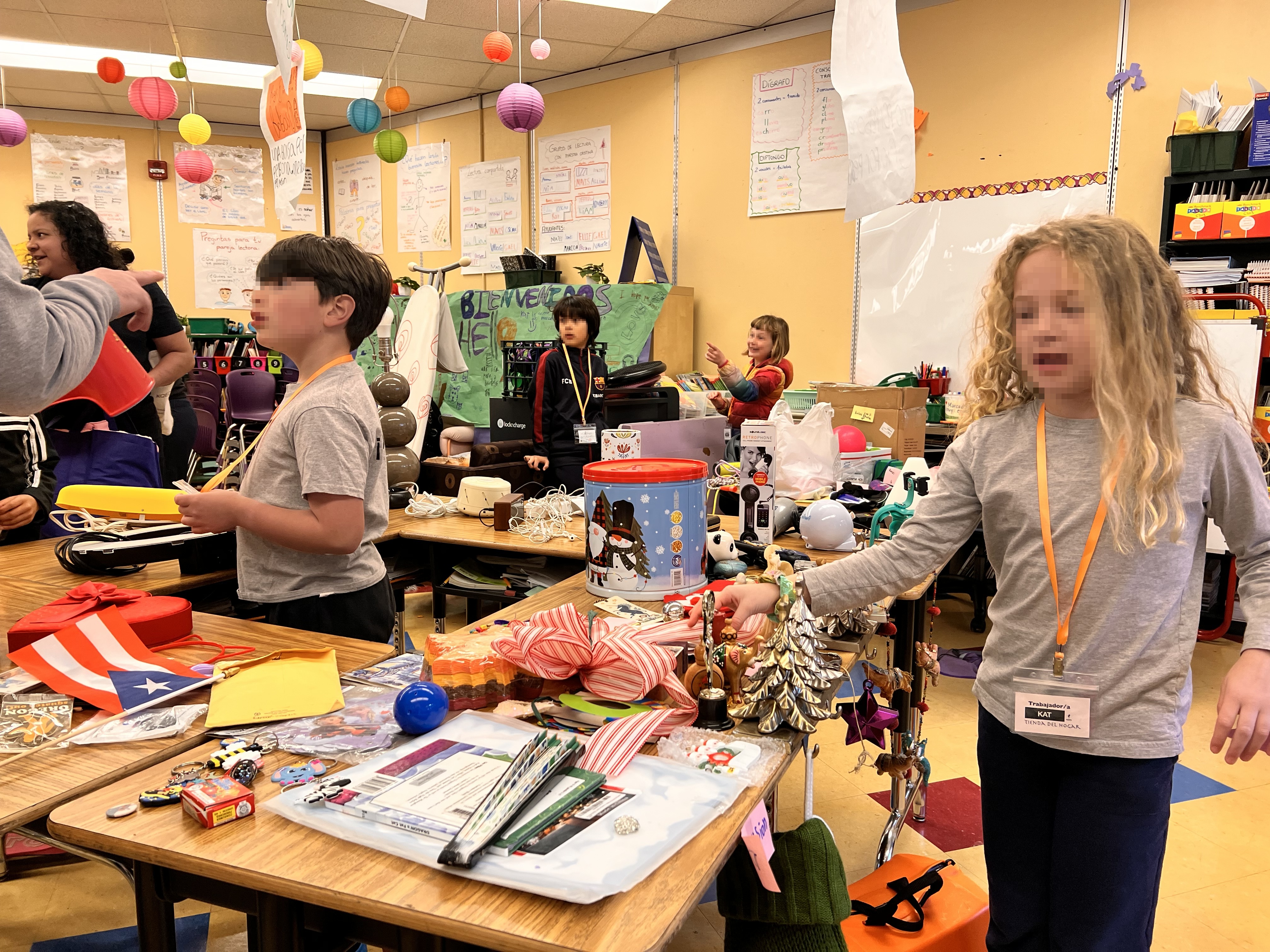 Students participating in a classroom Mercadito